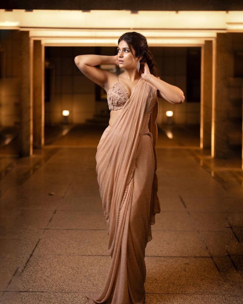 Shraddha Das radiates confidence and grace in a traditional saree during her recent photoshoot