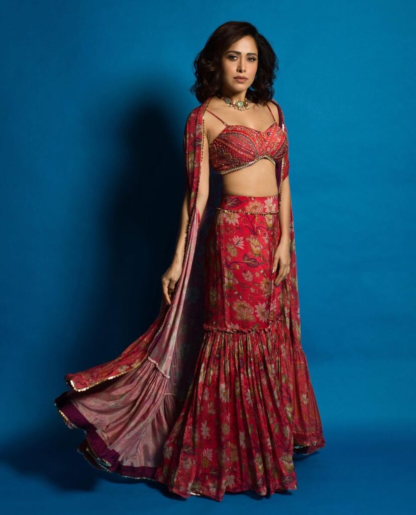 Capture the essence of style in this pink printed lehenga