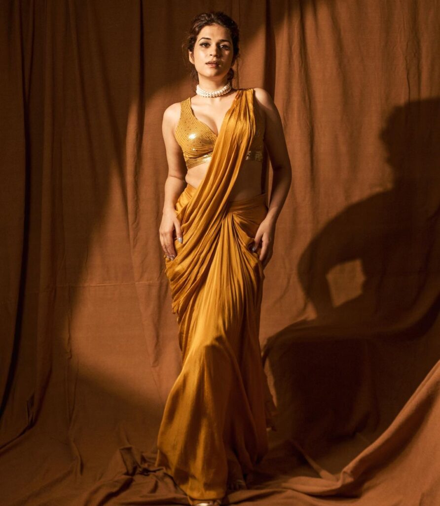 "Shraddha Das stuns in her yellow saree photoshoot