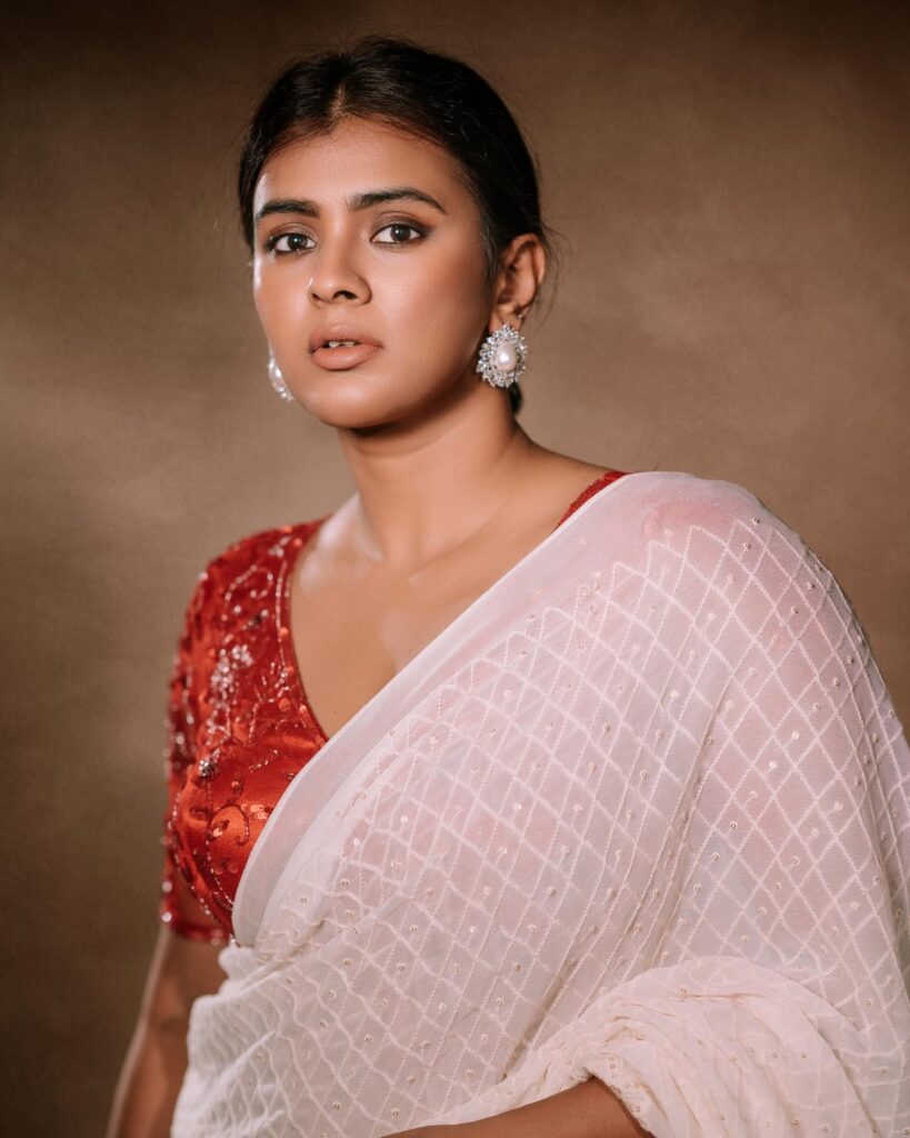 Hebah Patel stuns in red and white saree.