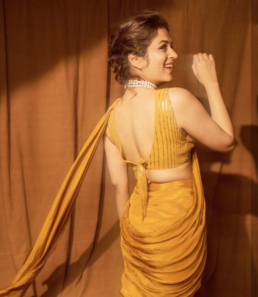 Gorgeous Shraddha Das dons a bright yellow saree