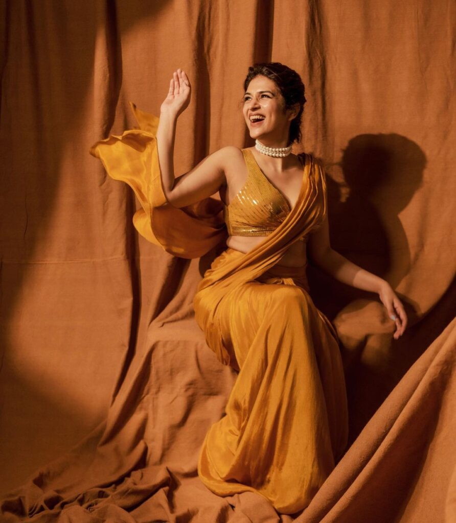 Shraddha Das flaunts style in a chic yellow saree