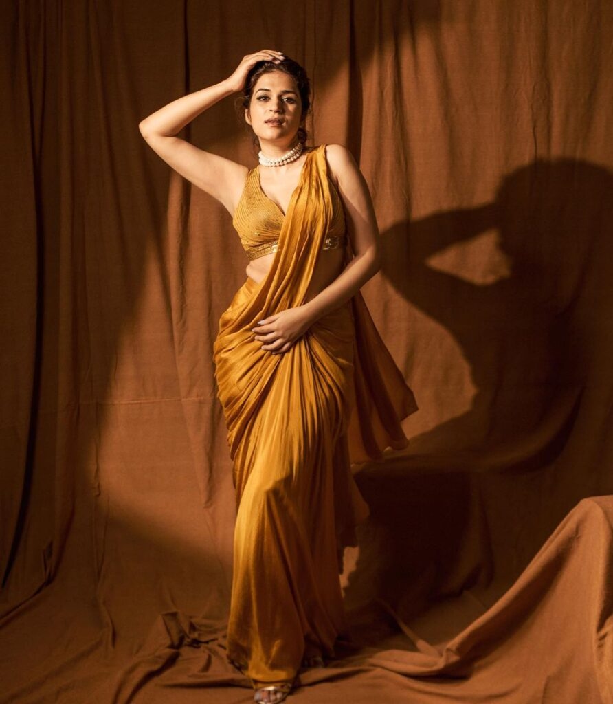 Shraddha Das looks enchanting in a yellow saree
