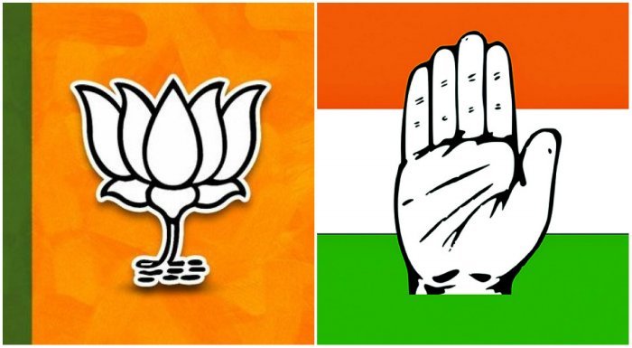 Emblems of BJP and Congress Party from left to right