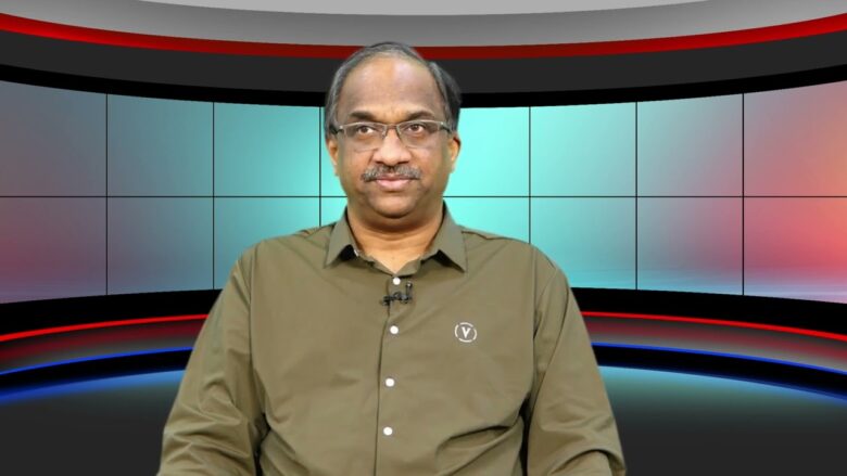 Prof. K. Nageshwar Rao in a green shirt.