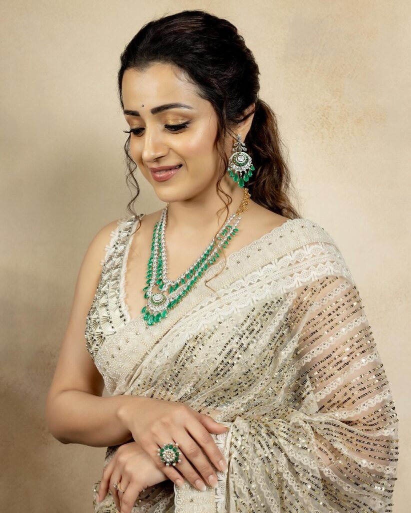 Trisha radiates elegance in white-green saree
