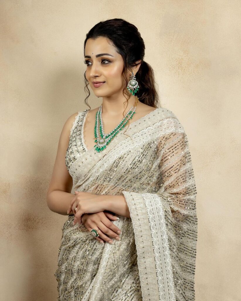 Trisha exudes elegance in a white and green saree