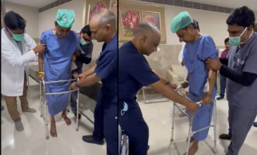 KCR walks with crutches after hip surgery.