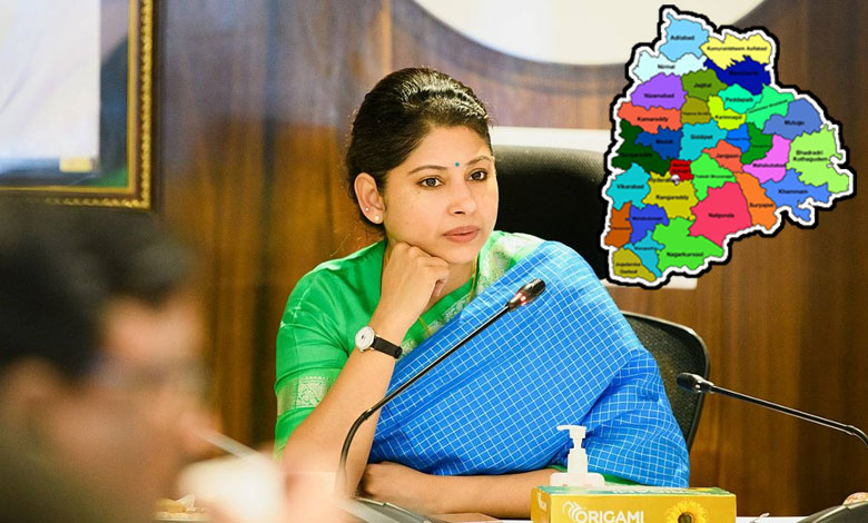 Smita Sabharwal in a conference and a Telangana map.