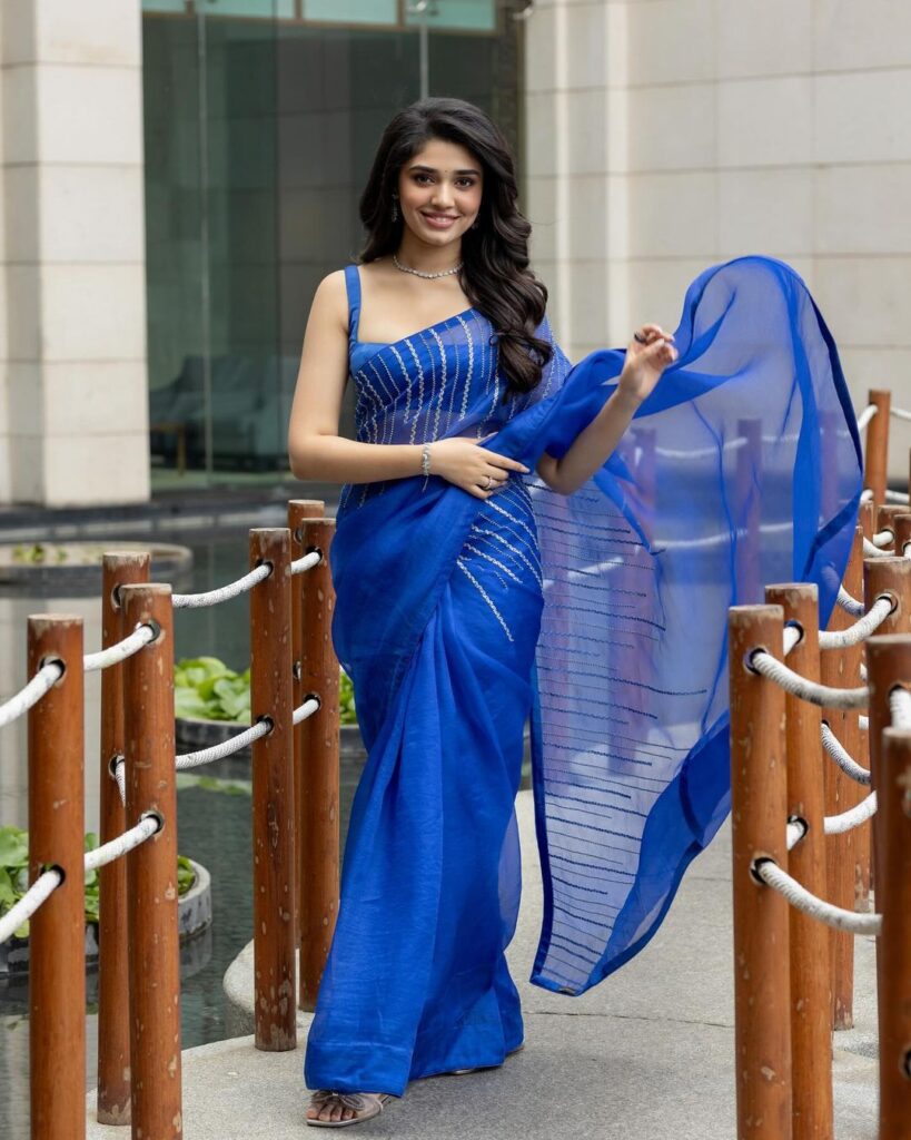 Krithi Shetty exudes elegance in a stunning blue saree photoshoot
