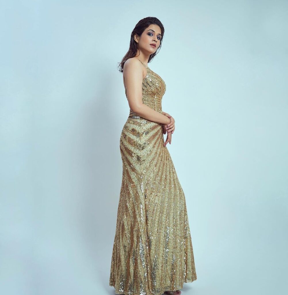 Shraddha Das shines in a stunning silver dress with matching pearl accessories
