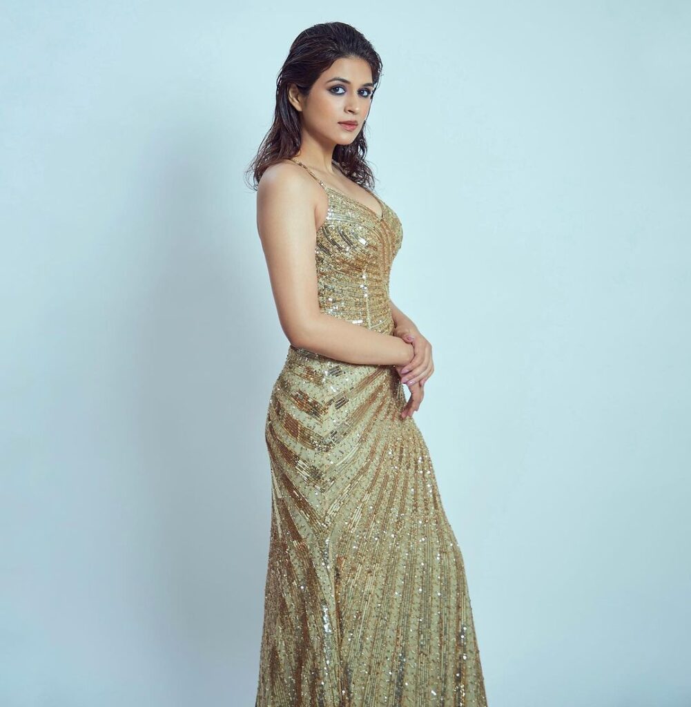 Shraddha Das in gold long gown