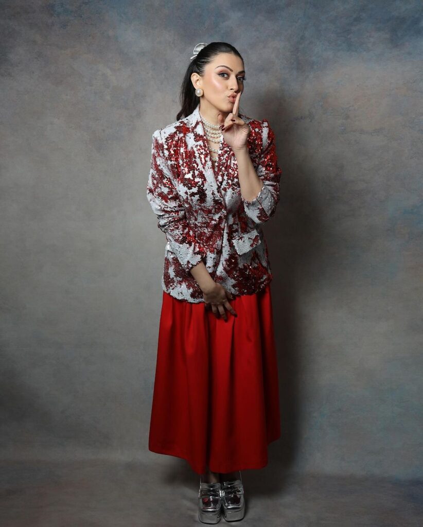 Hansika's trendy look: red and grey designer blazer, paired with a bodycon dress