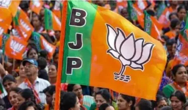 BJP flag with many bjp flags behind.