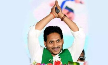 YS Jagan with a green scarf.