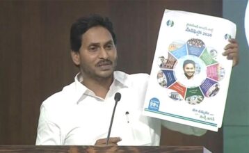 CM YS Jagan with YSRCP's manifesto for the 2024 AP elections.