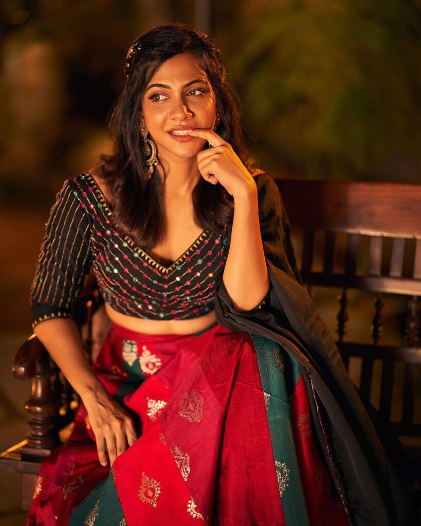 Madonna Sebastian stuns in a red and black traditional ensemble for a classic shoot