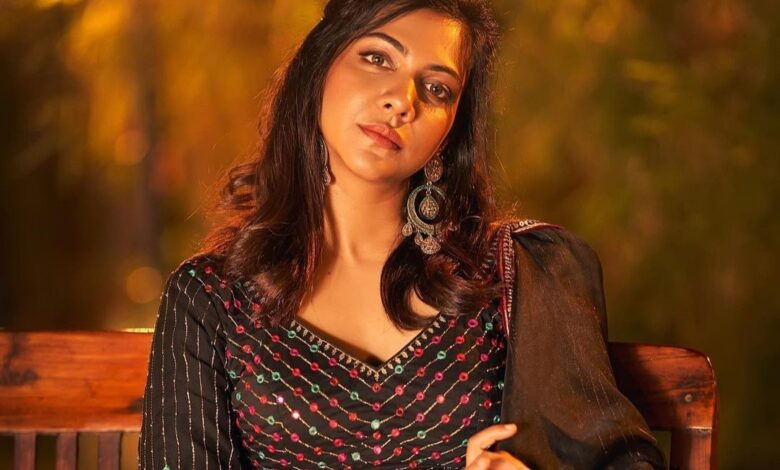 Madonna Sebastian dons a stunning red and black traditional ensemble