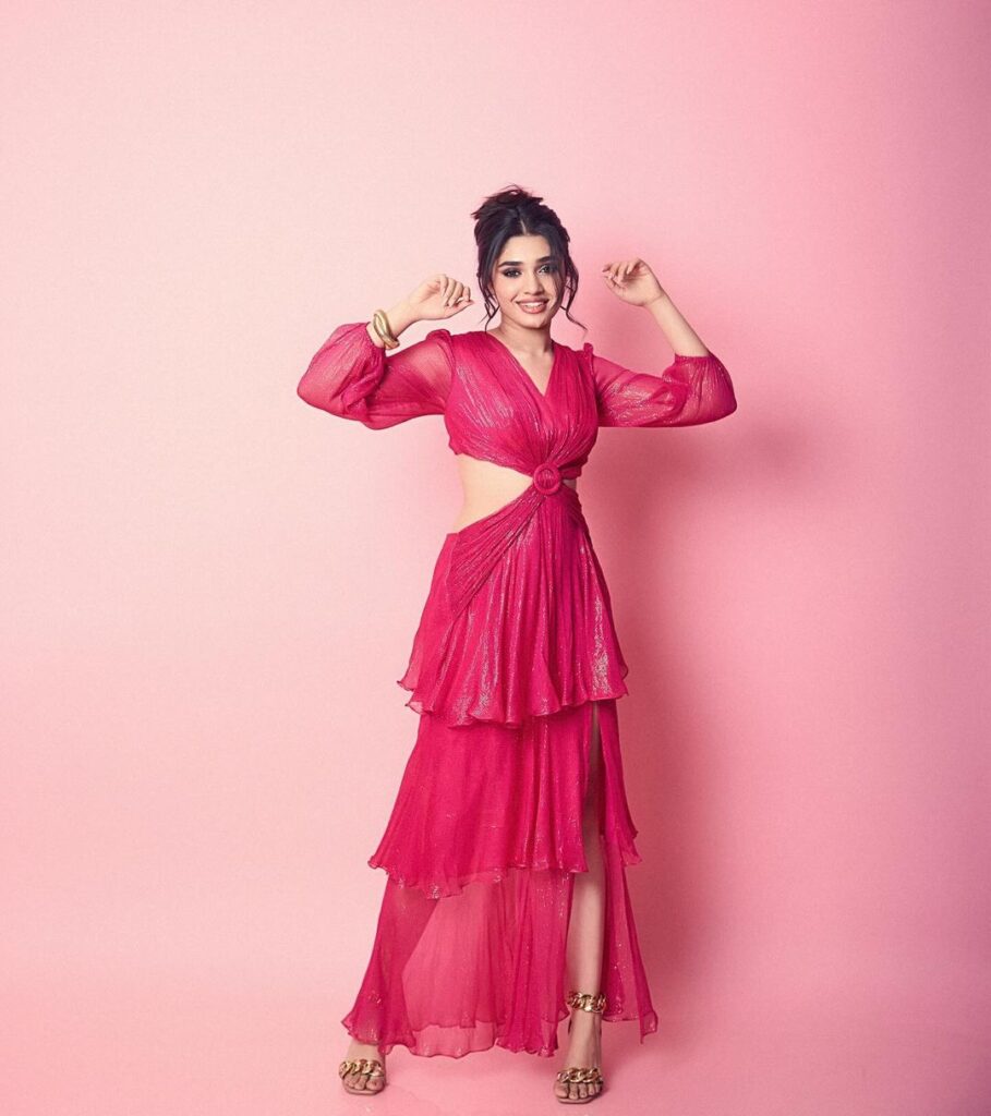 Krithi Shetty's high ponytail and chic pink ensemble redefine sophistication