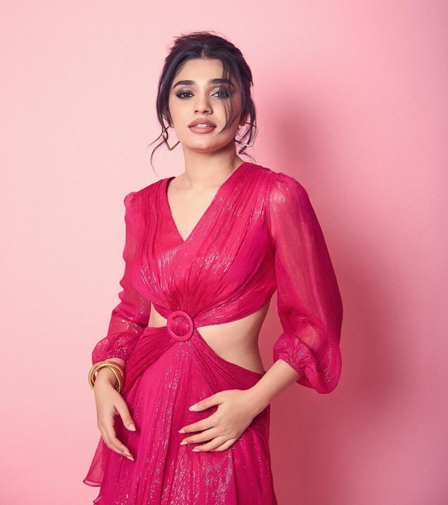 Krithi Shetty stuns in a pink thigh-high slit dress