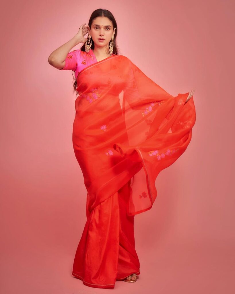 Aditi Rao Hydari elegantly draped in orange saree