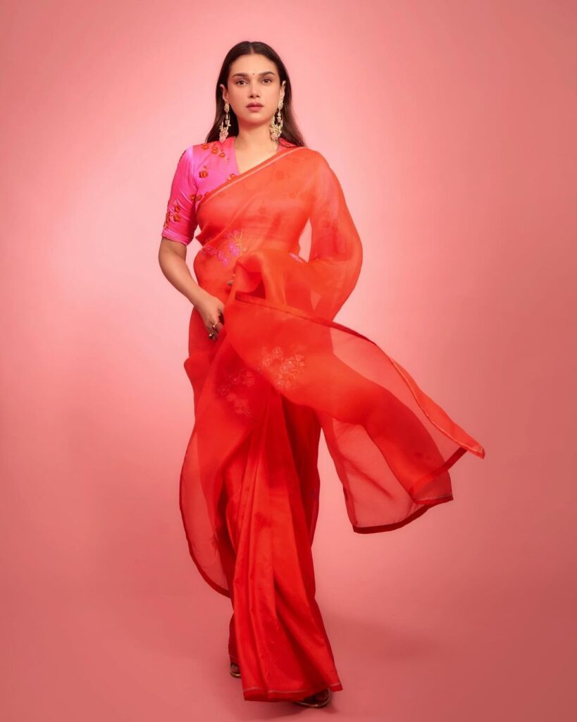 Aditi Rao Hydari in vibrant orange saree, pink blouse