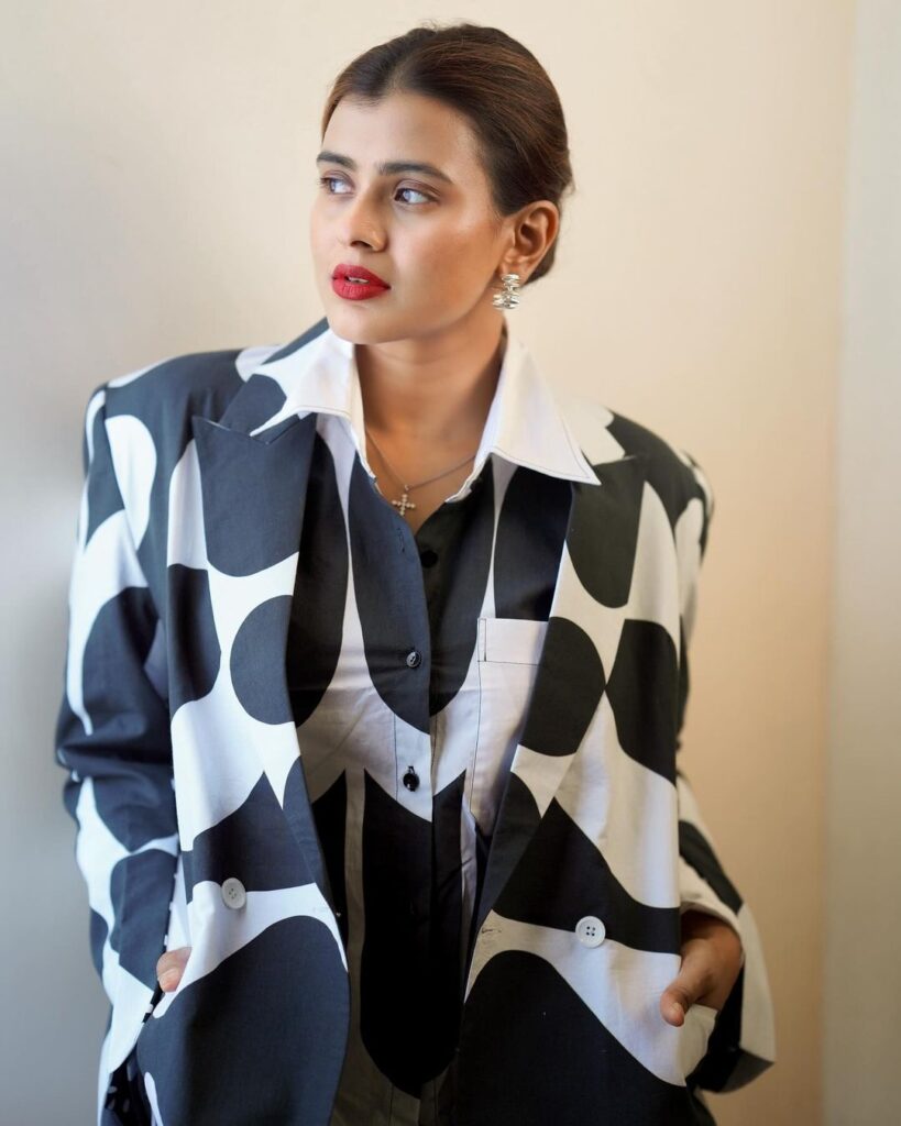 Hebah flaunts a trendy Black and White jacket