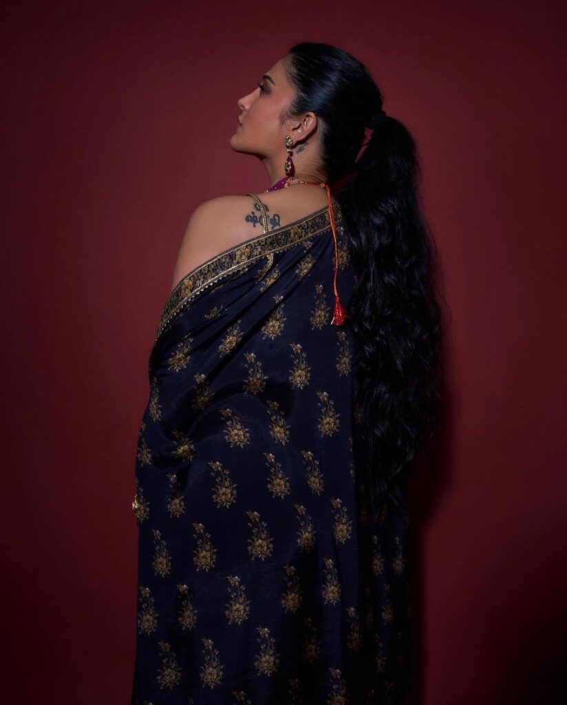 Shruti Haasan flaunts maroon top Back Photo Pose